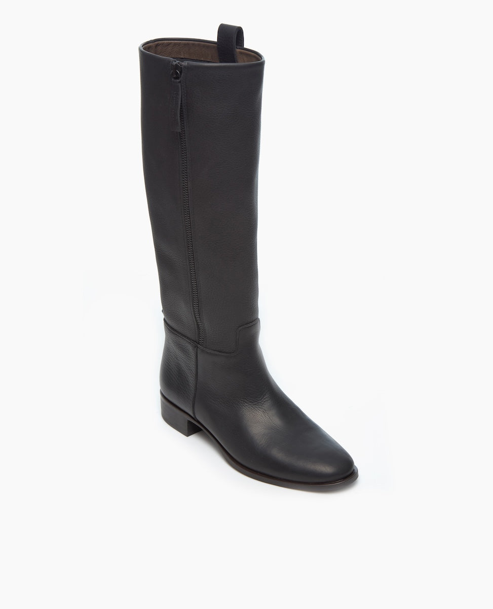 A single, sleek black leather knee-high boot with a low heel is displayed against a plain white background.