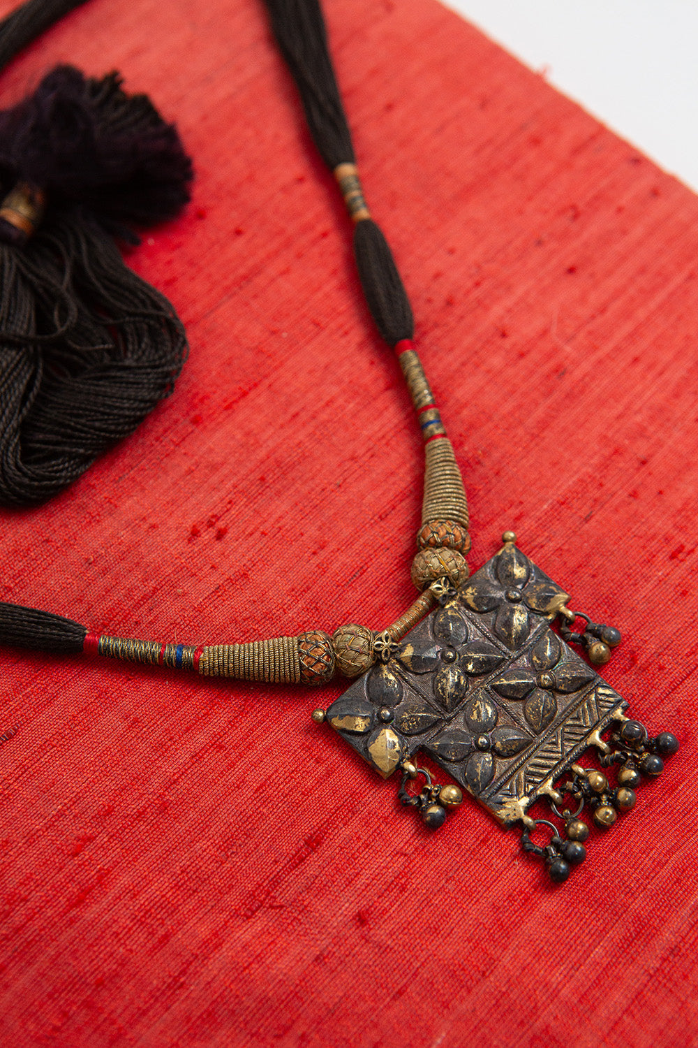 Indian Gilt Metal Necklace With Black Silk Cord