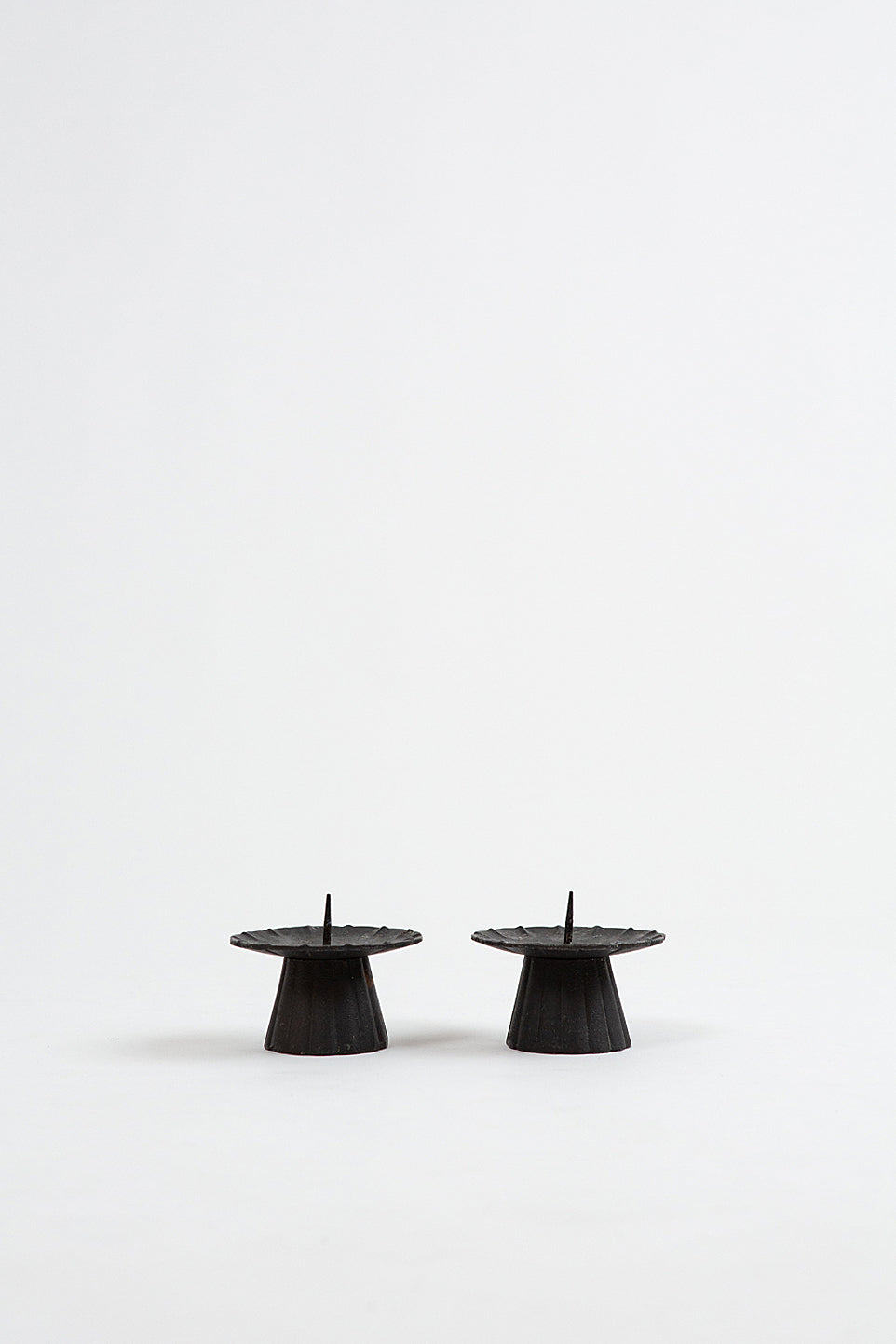 Pair of Rustic Black Iron Candlesticks