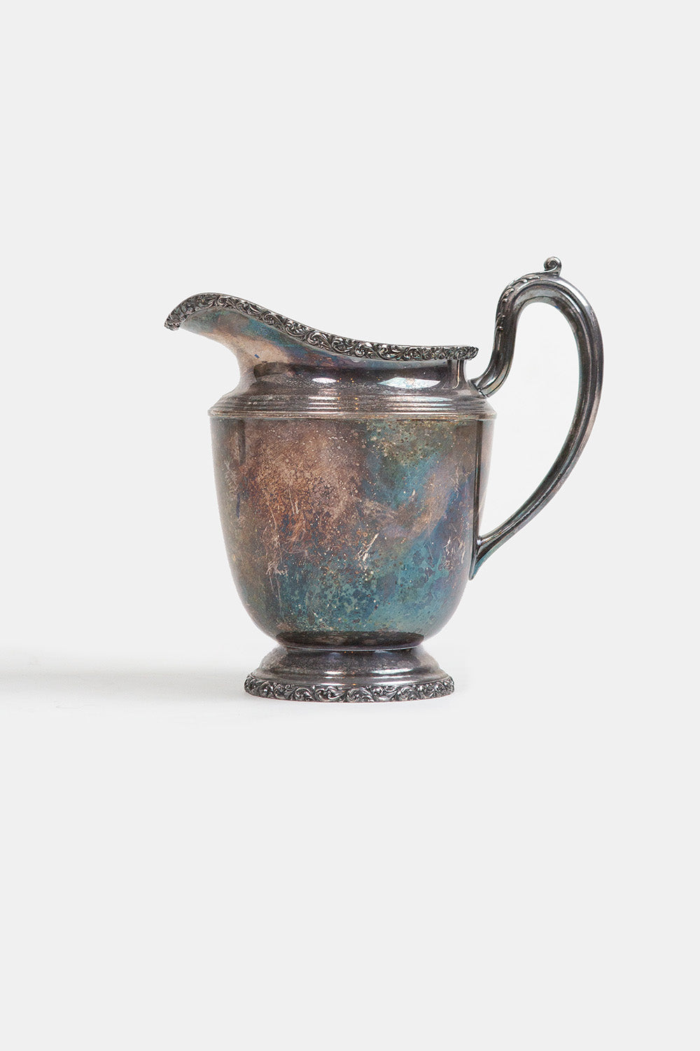 Ornate Silver Pitcher